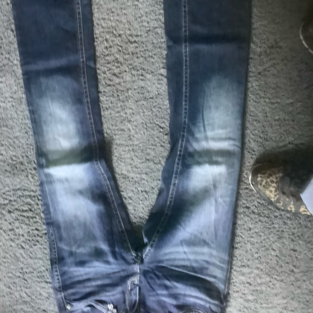 2pairs rock revival  jeans size 30 . Condition on good and fair.long.